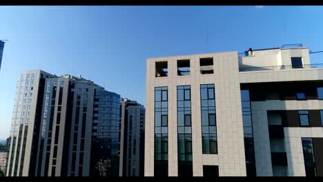 Modern-buildings-in-the-center-of-the-old-city,-top-view