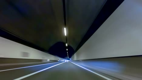 Fast-driving-by-a-tunnel-with-preponderance-up.-Vehicle-shot