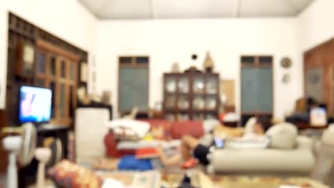 Defocus-of-family-living-in-living-room