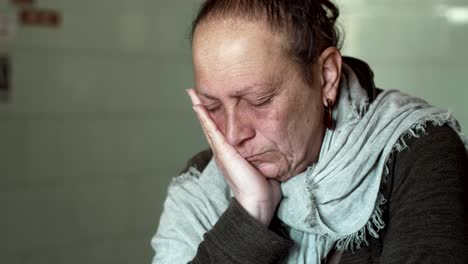 portrait-of-Sad-pensive-lonely-old-woman-thinking--indoor