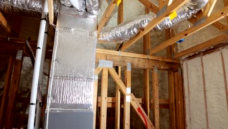 Closeup-on-termal-insulation-installing-at-the-attic-insulation-of-the-house