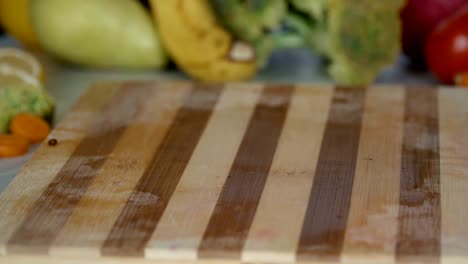 Banana-falls-on-cutting-board-in-slow-motion