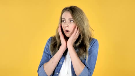 Pretty-Girl-Confused-and-Scared-of-Problems-on-Yellow-Background