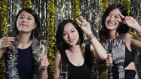 cute-girls-dancing-at-nightclub-facing-camera