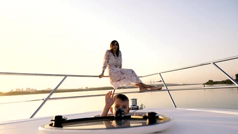 Mom-and-baby.-Mom-and-baby-are-sailing-on-a-yacht.