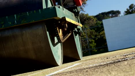 Cricket-roller-used-to-prepare-pitch-on-cricket-ground