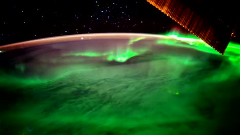 Earth-and-Aurora-Borealis-from-ISS.-Elements-of-this-video-furnished-by-NASA.-8K-Timelapse