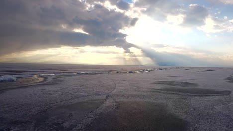 Flying-over-iced-sea-or-ocean-by-helicopter-.