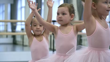 Girls-Warming-Up-Before-Dance-Class