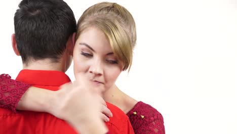 Couple.-Woman-sad-whispering-to-man-ear-hugging-partner-4K