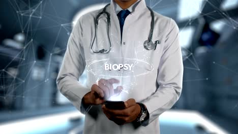 BIOPSY---Male-Doctor-With-Mobile-Phone-Opens-and-Touches-Hologram-Treatment-Word