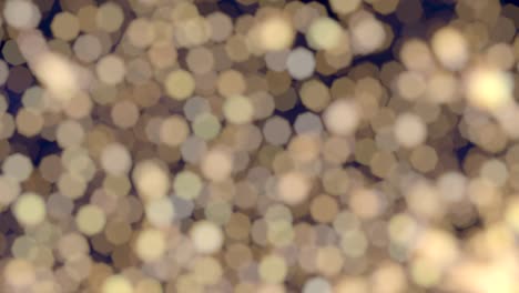 Twinkling-Bokeh-Gold-Lights-Blue-Background-Glitter-Effect-Loop