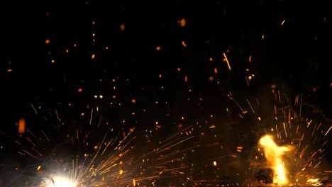 Fire-and-flames-of-firecracker-explosion-on-black-background