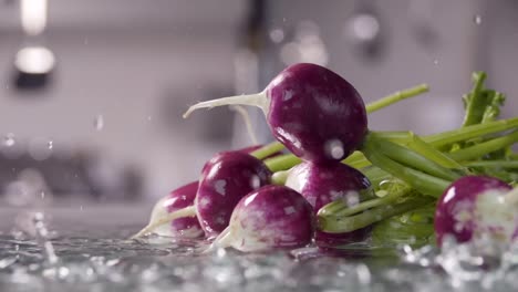 Falling-of-radish-into-the-wet-table.-Slow-motion-240-fps