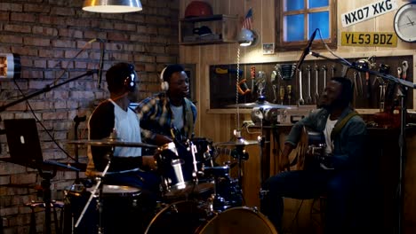 Young-musicians-rehearsing-in-garage