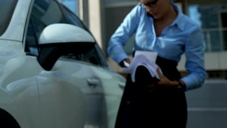 Clumsy-business-woman-getting-out-of-auto,-throwing-papers,-bad-day-at-work