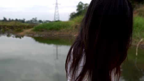 asian-woman-make-up-ghost-face-at-the-swamp