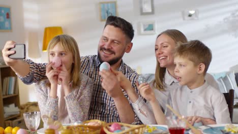 Family-Taking-Selfie-with-Easter-Eggs