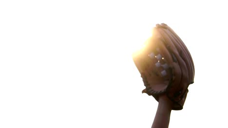 Close-UPS-ese-guante-de-béisbol-con-jugadores-de-béisbol-en-el-béisbol