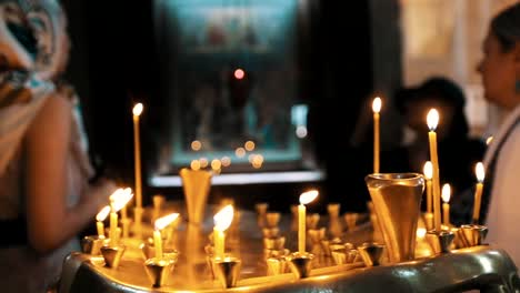 Many-Candles-Burning-in-a-Church