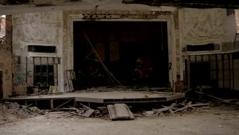 CLOSE-UP:-Graffiti-adorn-ruined-theatre-stage-in-abandoned-City-Methodist-Church