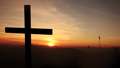 Crucifix-on-Mountain-during-Sunset.-Beautiful-Nature-and-Calm-Atmosphere.