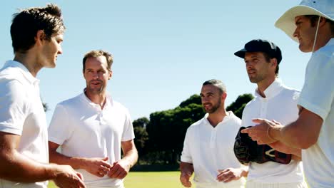 Cricket-players-into-team-discussion-during-cricket-match