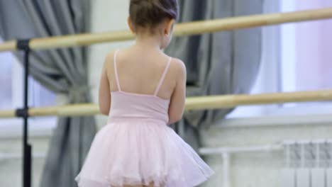 Girl-Dancing-with-Pointe-Shoes-in-Hands