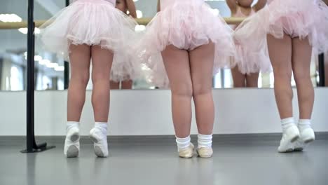 Little-Girls-Standing-by-Ballet-Barre