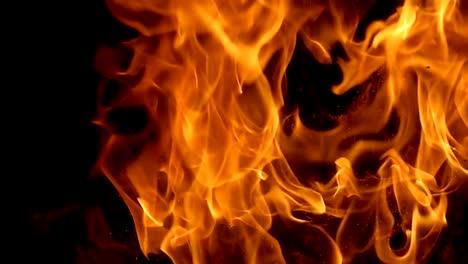 Flames-of-fire-on-black-background-in-slow-motion