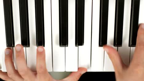 Brothers-Playing-in-Tandem-a-Piano-Partiture