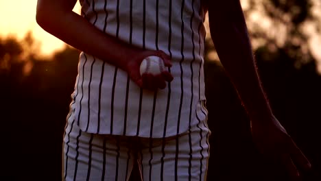 Baseball-Men-are-hand-signals-to-his-teammates-before-throwing-a-baseball