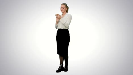 Annoyed-young-woman-having-bad-news-from-her-angry-boss-by-the-phone-on-white-background