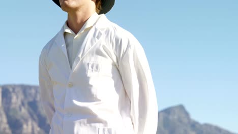 Cricket-umpire-signaling-six-during-match