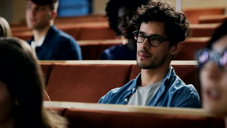 Large-Group-of-Multi-Ethnic-Students-Listening-to-a-Lecture-in-the-Classroom.-Bright-Young-People-Study-at-University.