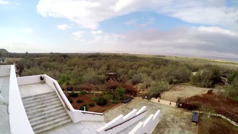 Panorama-of-the-West-Bank,-Palestine,-view-from-the-baptism-site-of-Jesus-Christ-at-the-River-Jordan,-Wadi-Al-Kharrar,-Jordan