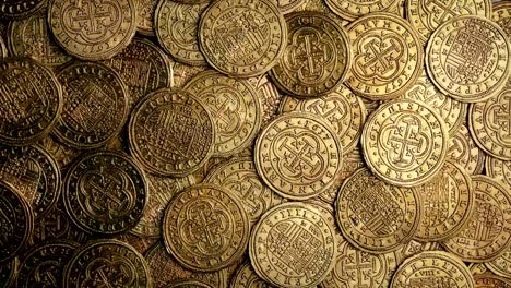 Medieval-Gold-Coins-Pile-Rotating-Overhead-Shot