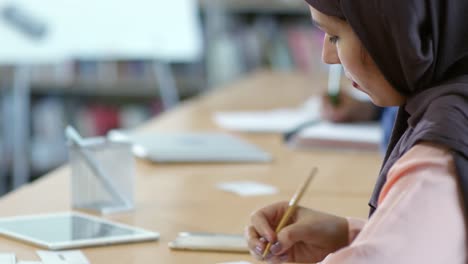 Muslim-Woman-Taking-Test-at-College