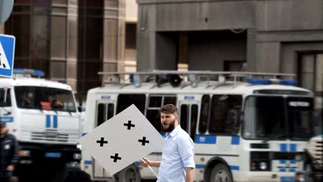 Angry-man-screaming-stop-at-a-rally-in-a-loudspeaker.-Person-said-no-to-protest.