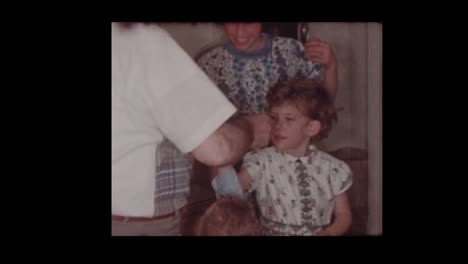 1956-Grandfather-hands-out-money-to-kids-for-Afikoman-Afikomen-at-Passover