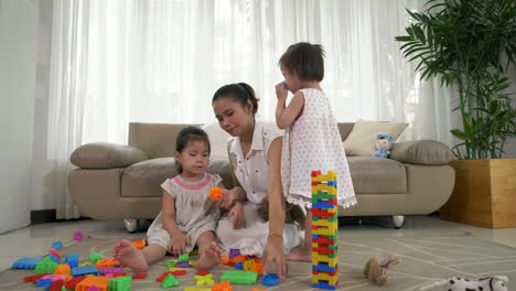 Woman-Playing-with-Kids