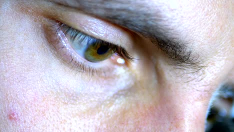 Serious-Look-of-a-Young-Man-who-Concentrated-Works-on-a-Black-Background.-Slow-motion