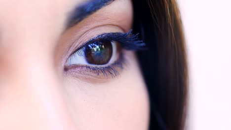 Close-up-portrait-of-pensive-sad-Asian-woman-open-her-eyes