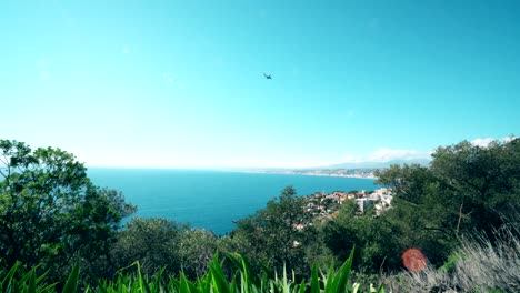 Plane-landing-in-Nice-airport-cote-d'azur.-Sea-and-sun.