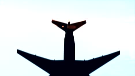 Slow-motion-shot-of-a-plane-passing-overhead.