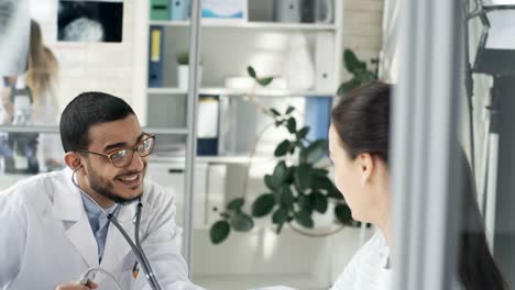 Doctor-Checking-Blood-Pressure-with-Sphygmomanometer