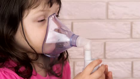 Asthma.-The-child-inhales-the-nebulizer-mask.