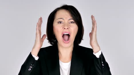 Portrait-of-Screaming-Businesswoman-going-Crazy