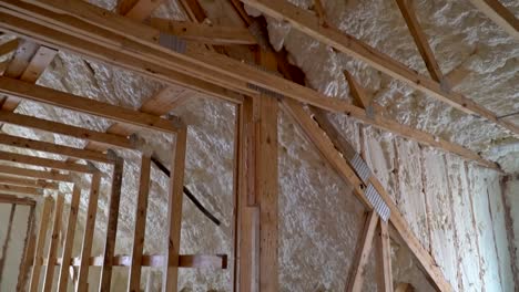 Closeup-on-termal-insulation-installing-at-the-attic-insulation-of-the-house