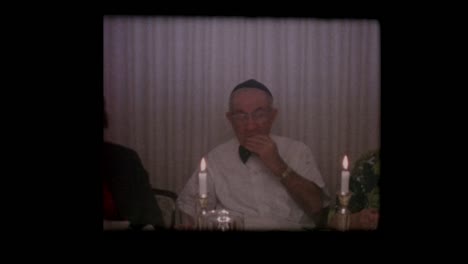 1963-Jewish-family-eats-Matzo-at-Passover-seder-table